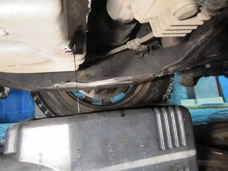 Слив масла из трансмиссии Mazda CX-7